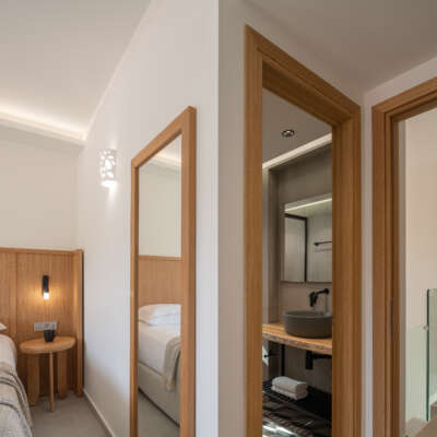 The bedroom features an ensuite bathroom