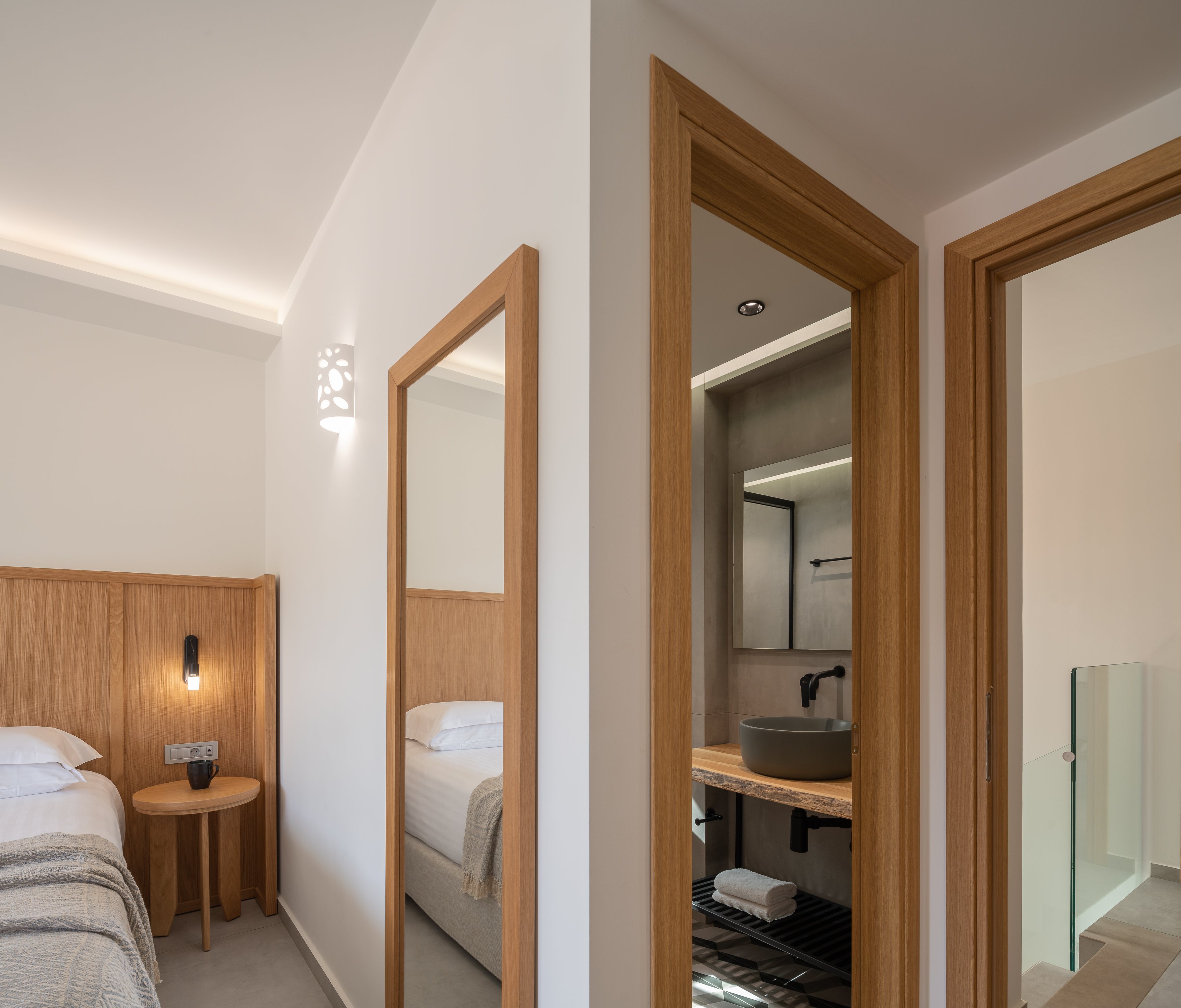 The bedroom features an ensuite bathroom