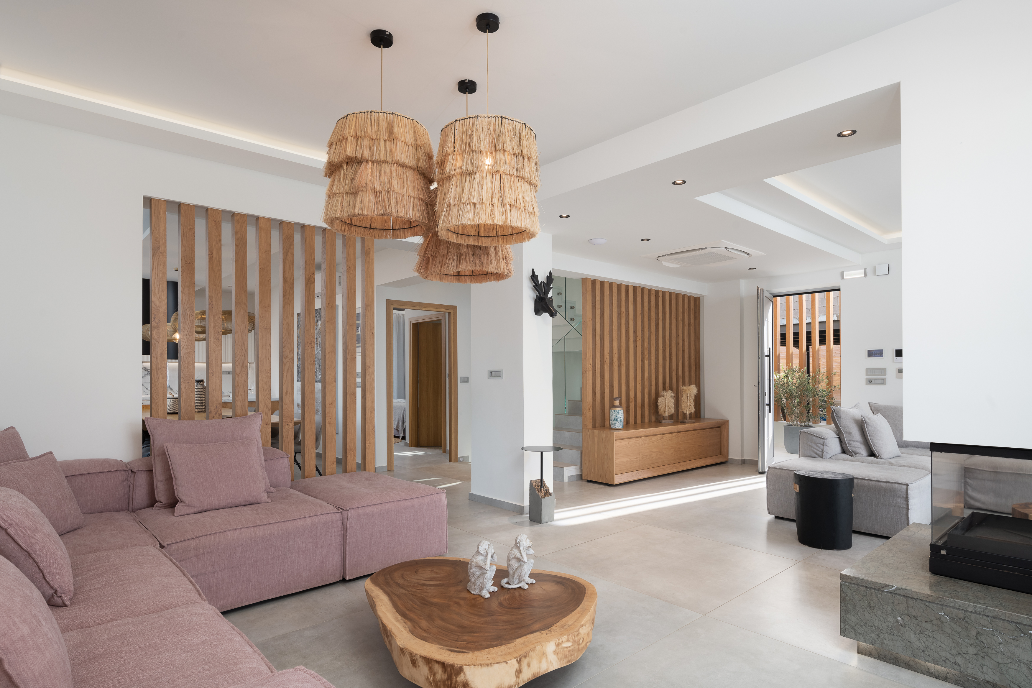 The living room features an open fire place.